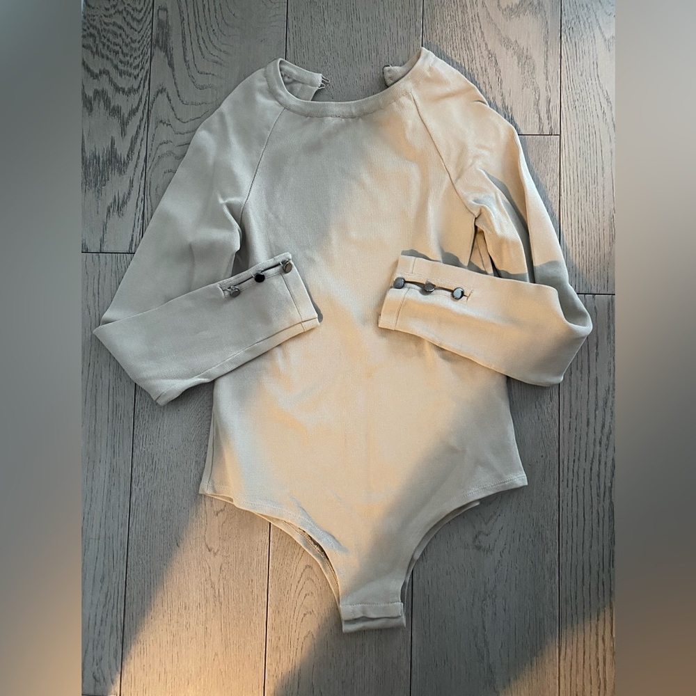 Gorgeous bodysuit 100% new